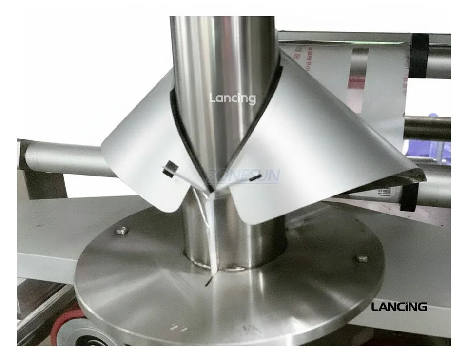 Close-up of powder dosing and bag forming equipment used for planning guides