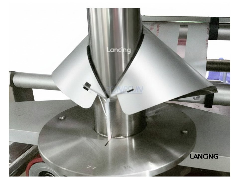 Close-up of powder dosing and bag forming equipment used for planning guides